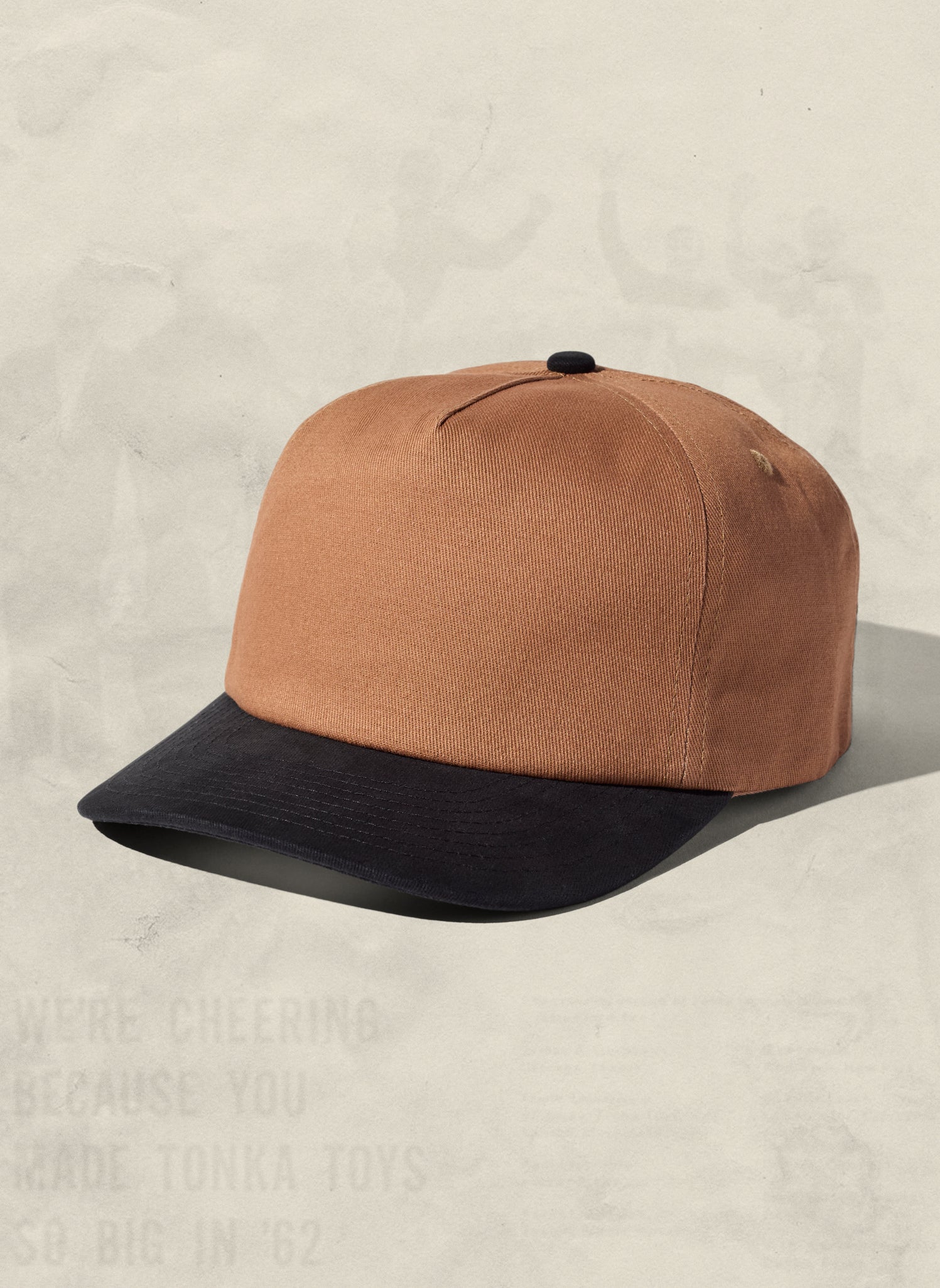 WELD MFG Two-Tone Brushed Cotton Twill Workhorse Snapback Hat with a slightly structured 5-panel crown and contrasting curved brim, Dune Black