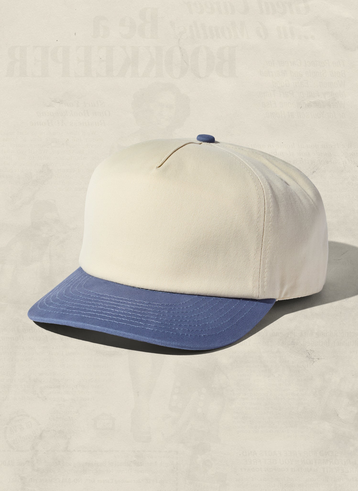WELD MFG Two-Tone Brushed Cotton Twill Workhorse Snapback Hat with a slightly structured 5-panel crown and contrasting curved brim, Slate Blue
