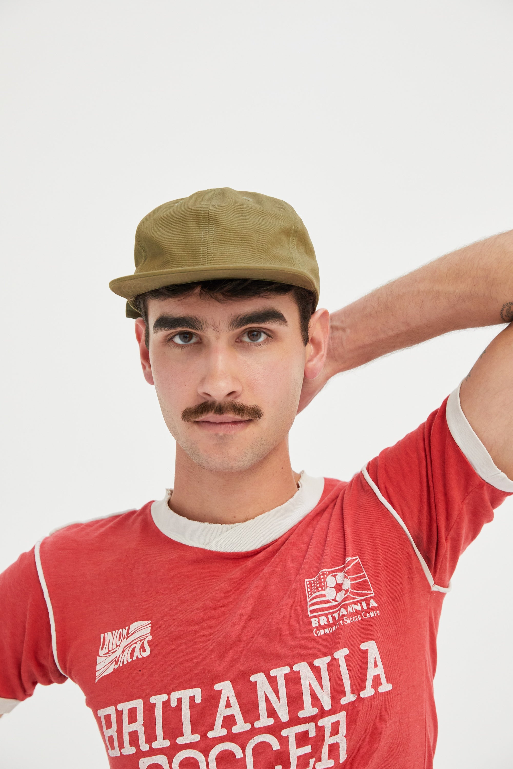 Front of a male wearing a Cactus Weld Mfg Brushed Cotton Twill 6 Panel Unstructured Field Trip Hat.