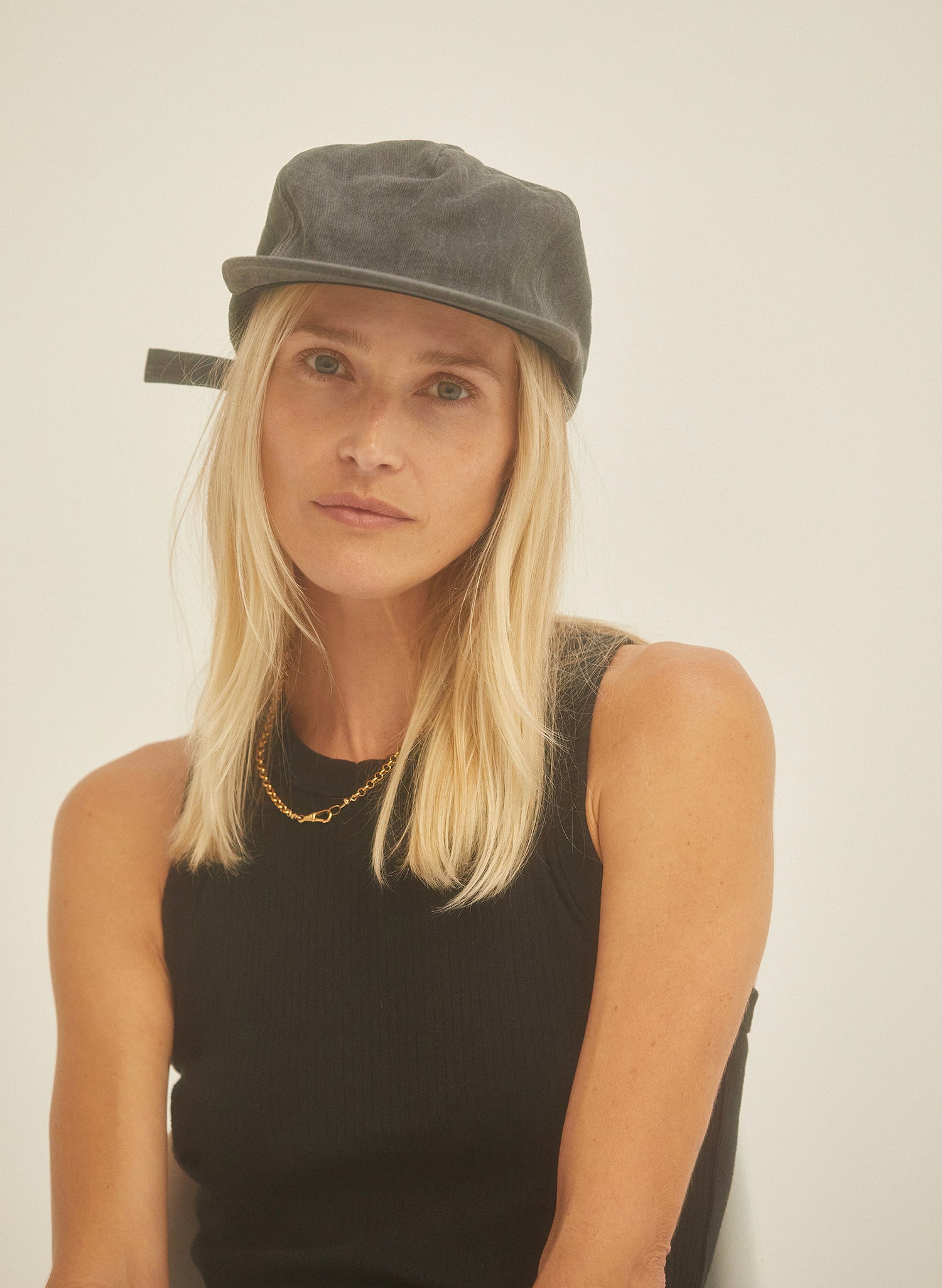 Lifestyle shot of the WELD MFG Field Trip Hat for outdoor and casual wear, Vintage Black